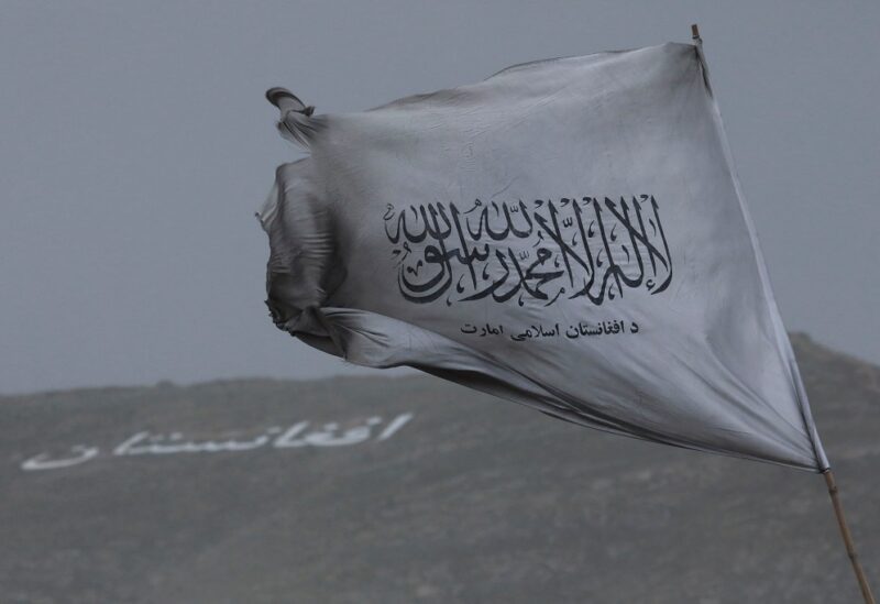 Taliban's flag is seen in a marketplace in Kabul, Afghanistan, May 10, 2022. REUTERS/Ali Khara/File Photo