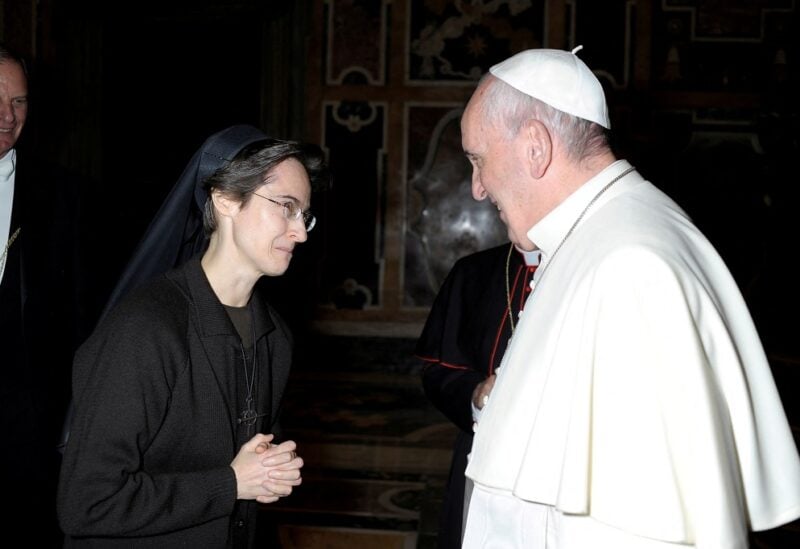 Italian nun Sister Raffaella Petrini, who is the first woman to be appointed as the number two position in the governorship of Vatican City, is greeted by Pope Francis in this undated handout photo released by the Vatican on November 5, 2021. Vatican Media/Handout via REUTERS