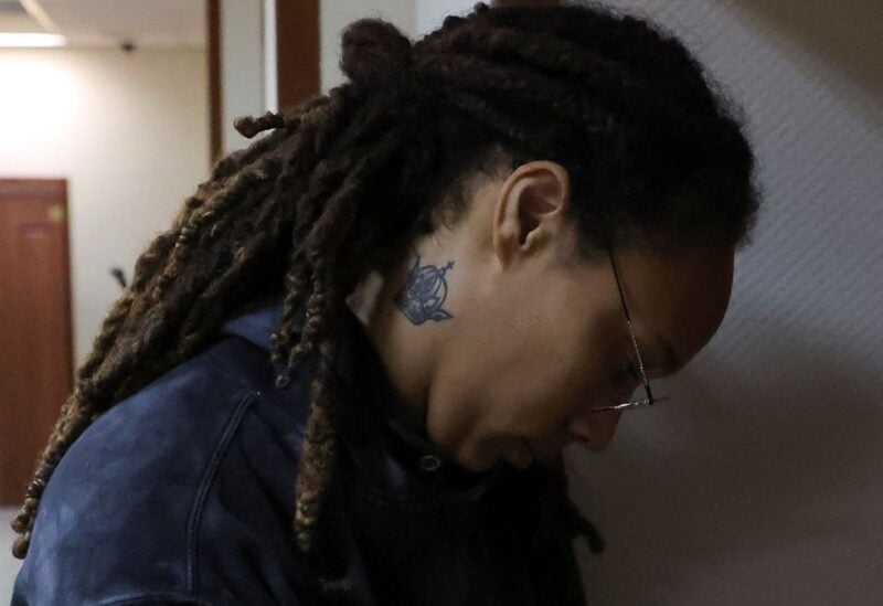 U.S. basketball player Brittney Griner, who was detained at Moscow's Sheremetyevo airport and later charged with illegal possession of cannabis, is escorted before a court hearing in Khimki outside Moscow, Russia July 26, 2022. REUTERS/Evgenia Novozhenina/Pool