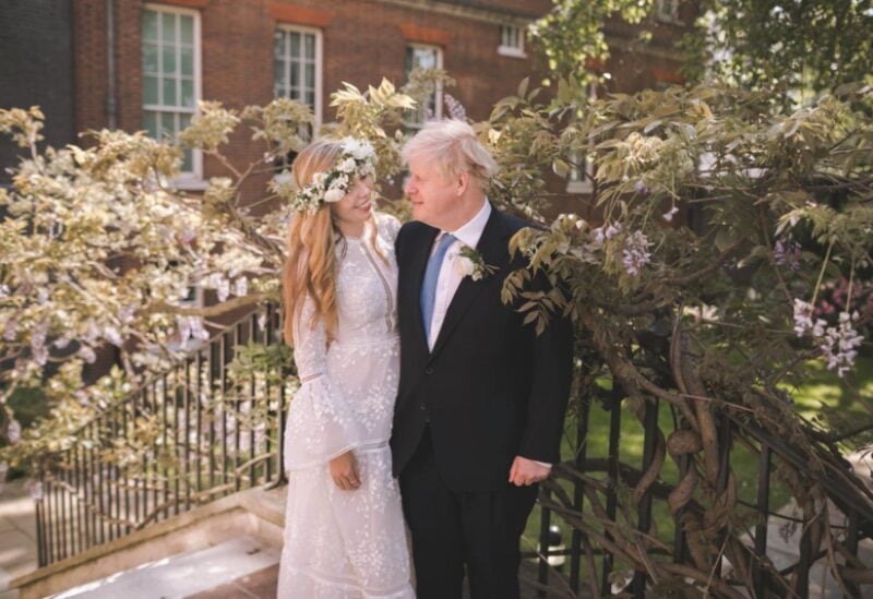 Boris and Carrie Johnson are seen in the garden of 10 Downing Street, after their wedding, in London, Britain May 29, 2021. Picture taken May 29, 2021. Rebecca Fulton/Pool via REUTERS