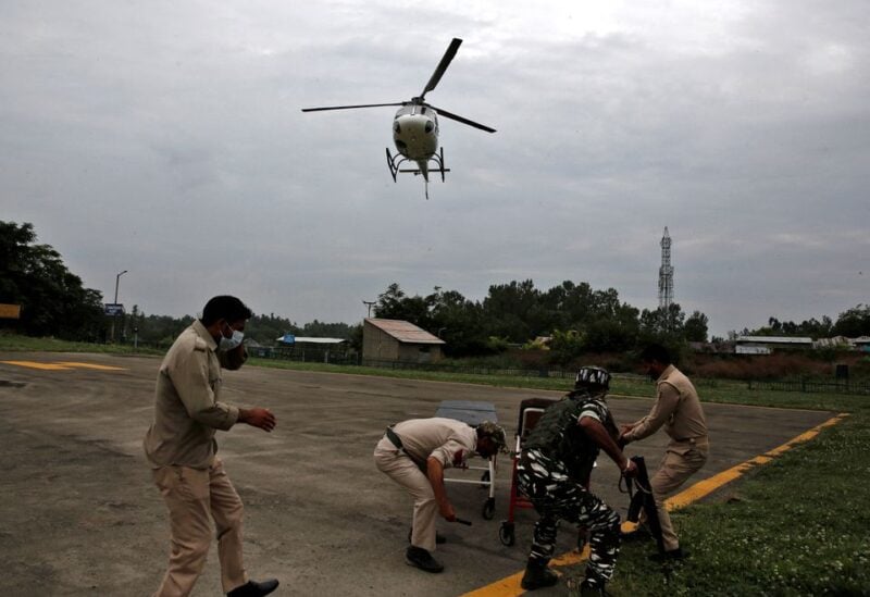 A helicopter arrives carrying injured people for treatment following a cloudburst near the holy Amarnath cave shrine, at Sher-i-Kashmir Institute of Medical Sciences hospital in Srinagar July 9, 2022. REUTERS/Danish Ismail