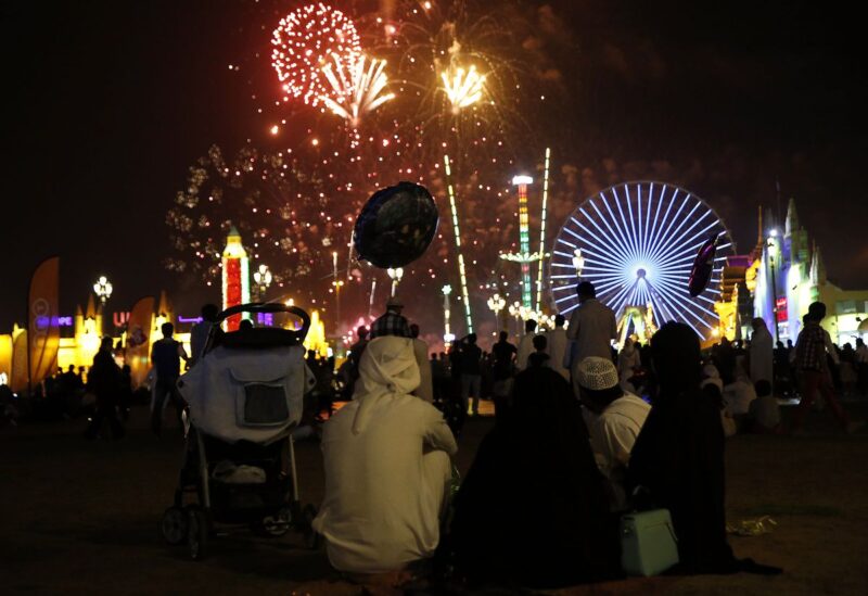 An Emirati family watches the fireworks display at the Global Village in Dubai February 13, 2015. REUTERS/Ahmed Jadallah/File Photo