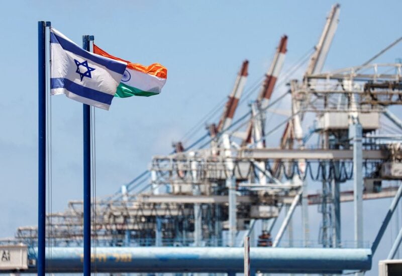 Israeli and Indian national flags fly at Haifa Port, which is to be sold to India's Adani Ports and local partner Gadot, in Haifa, Israel July 24, 2022. REUTERS/Amir Cohen
