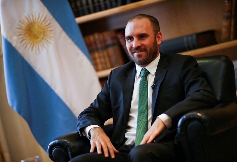 FILE PHOTO: Argentina's Economy Minister Martin Guzman poses for a picture before an interview with Reuters at the Economy Ministry, in Buenos Aires, Argentina December 10, 2020. REUTERS/Agustin Marcarian/File Photo