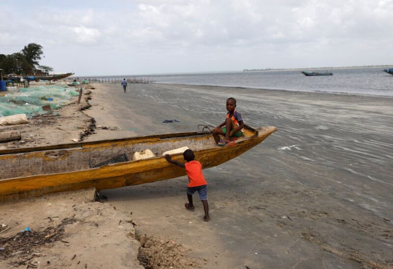 Senegalese island keeps coastal erosion at bay with stakes in the sand