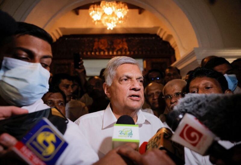 Ranil Wickremesinghe who has been elected as the Eighth Executive President under the Constitution speaks to media as he leaves a Buddhist temple