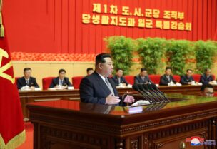 North Korea's leader Kim Jong Un addresses a special workshop for officials