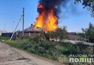 A view shows burning residential house hit by a Russian air strike, as Russia's attack on Ukraine continues, in Donetsk region, in the town of Bakhmut, Donetsk region, Ukraine July 27, 2022. Press service of the National Police of Ukraine/Handout via REUTERS ATTENTION EDITORS - THIS IMAGE HAS BEEN SUPPLIED BY A THIRD PARTY. DO NOT OBSCURE LOGO.