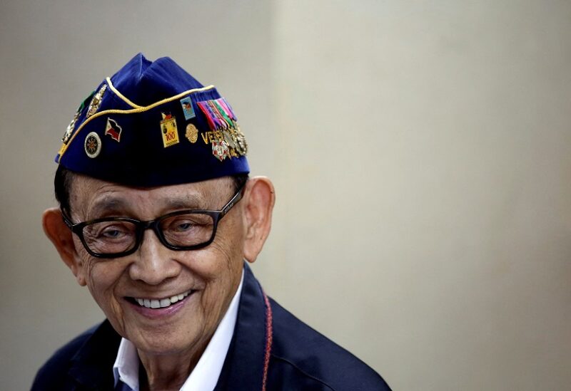 FILE PHOTO: Former Philippine President Fidel Ramos reacts as he speaks to journalists during a trip to Hong Kong, China. Picture taken August 12, 2016. REUTERS/Tyrone Siu/File Photo