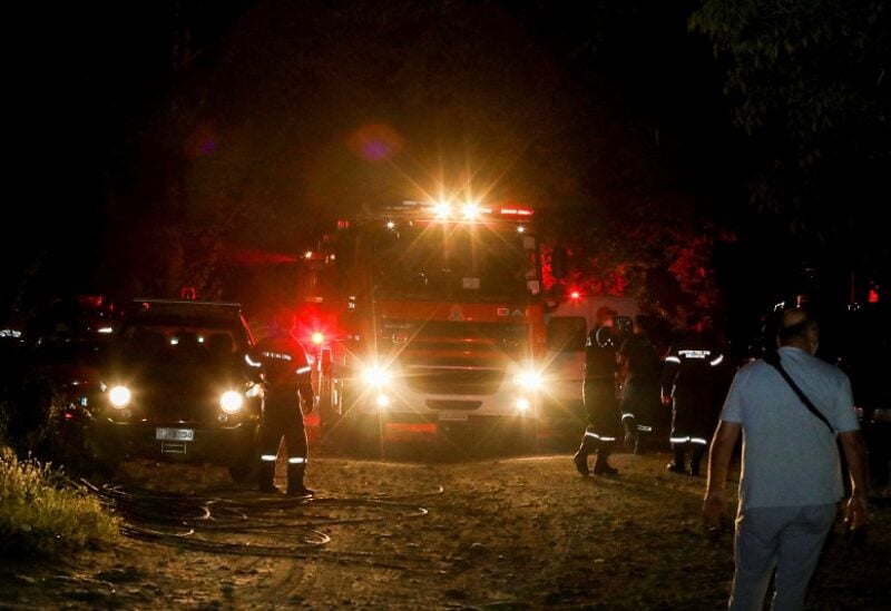 Firefighting vehicles and rescue crews are seen at the crash site of an Antonov An-12 cargo plane owned by a Ukrainian company, near Kavala, Greece, July 16, 2022. Laskaris Tsotsas/Eurokinissi via REUTERS ATTENTION EDITORS. THIS IMAGE HAS BEEN PROVIDED BY A THIRD PARTY. NO RESALES. NO ARCHIVES. NO EDITORIAL SALES IN GREECE