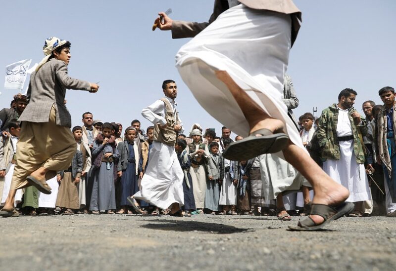 Houthi supporters perform the Baraa dance during a rally marking the Ghadeer day, a day Shi'ites believe Prophet Muhammad nominated his cousin Imam Ali to be his successor, in Sanaa, Yemen July 17, 2022. REUTERS/Khaled Abdullah TPX IMAGES OF THE DAY