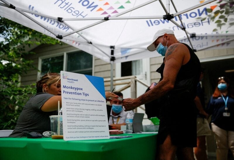 FILE PHOTO: A person arrives to receive a monkeypox vaccination at the Northwell Health Immediate Care Center at Fire Island-Cherry Grove, in New York, U.S., July 15, 2022. REUTERS/Eduardo Munoz/File Photo
