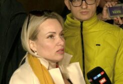 FILE PHOTO: Marina Ovsyannikova, a Channel One employee who staged an on-air protest as she held up a anti-war sign behind a studio presenter, speaks to the media as the leaves the court building in Moscow, Russia March 15, 2022 in this still image taken from a video. REUTERS TV via REUTERS/File Photo