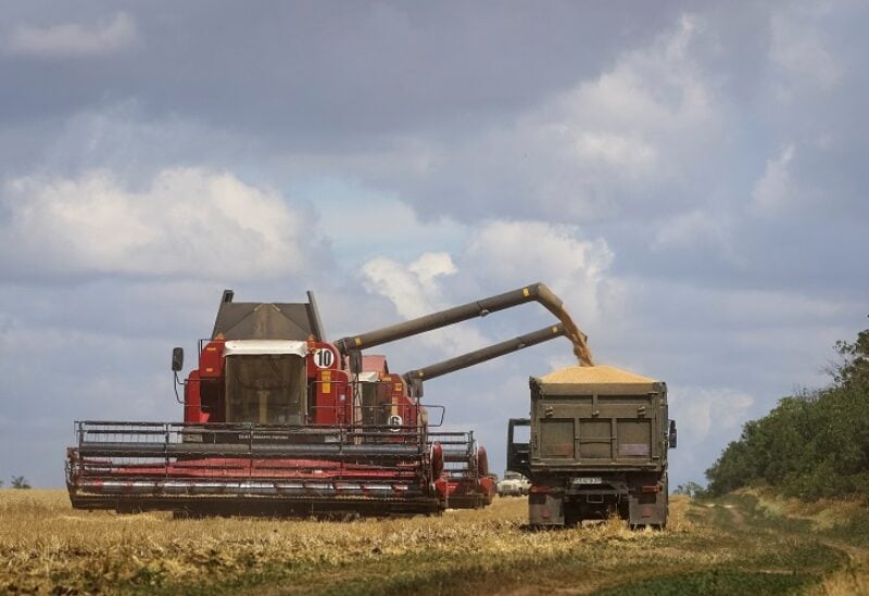 Combines lead wheat in Russian-held part of Zaporizhzhia region, Ukraine July 23, 2022. REUTERS/Alexander Ermochenko