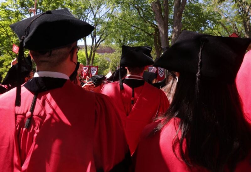 FILE PHOTO - Graduating students stand during Harvard University's 371st Commencement Exercises in Cambridge, Massachusetts, U.S., May 26, 2022. REUTERS/Brian Snyder