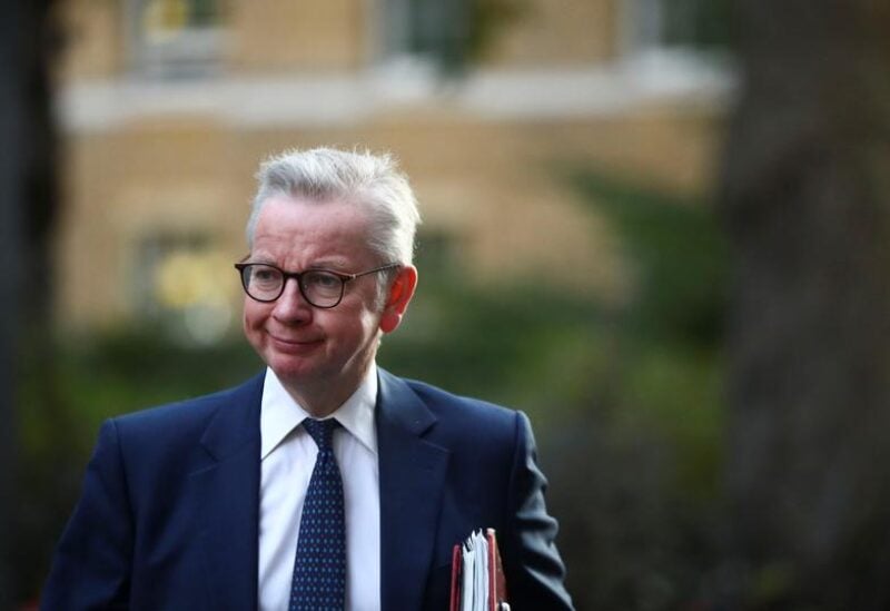 Britain's Chancellor of the Duchy of Lancaster Michael Gove walks outside Downing Street in London, Britain, September 22, 2020. REUTERS/Hannah McKay