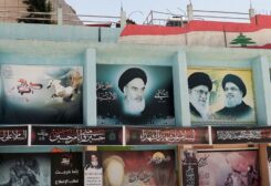 A view of banners depicting Iran's late leader Ayatollah Ruhollah Khomeini, Iran's Supreme Leader Ayatollah Ali Khamenei and Lebanon's Hezbollah leader Sayyed Hassan Nasrallah in the town of Yaroun, southern Lebanon August 15, 2022. REUTERS/Issam Abdallah