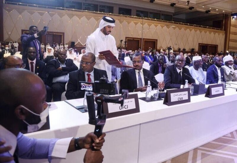 Officials attend a signing agreement for a national dialogue with Chad's transitional military authorities and rebels at Sheraton Hotel in Doha, Qatar August 8, 2022. REUTERS/Ibraheem Al Omari/File Photo