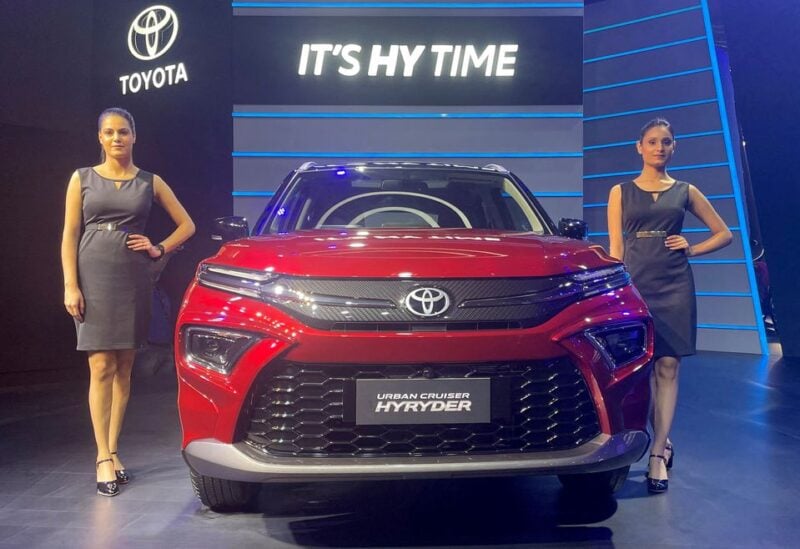 Models pose at the unveiling of Toyota's new hybrid SUV Urban Cruiser Hyryder in New Delhi, India, July 1, 2022. REUTERS/Aditi Shah