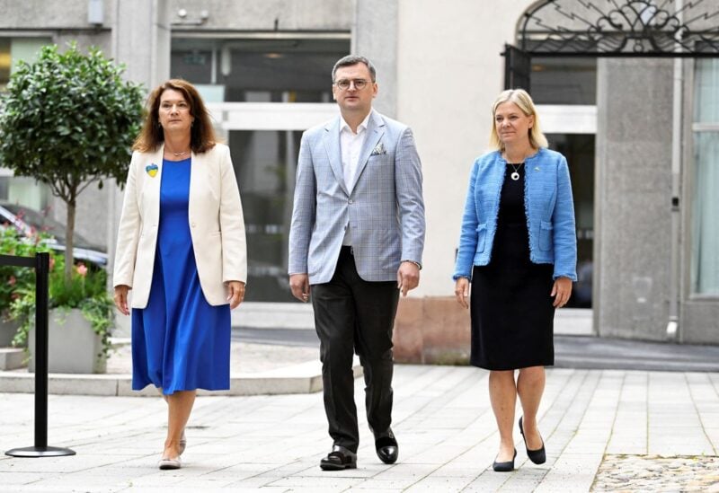 Sweden's Foreign Minister Ann Linde, Ukrainian Foreign Minister Dmytro Kuleba and Swedish Prime Minister Magdalena Andersson meet in Stockholm, Sweden August 29, 2022. TT News Agency/Jessica Gow via REUTERS