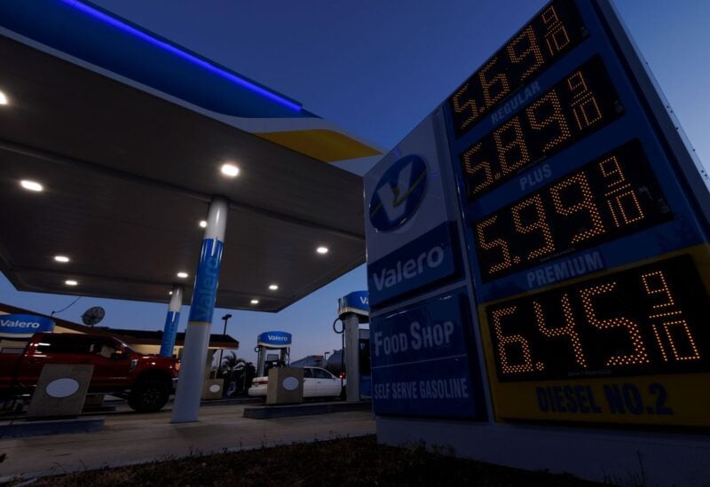 Gasoline prices are displayed as fuel costs continues to climb close to record setting territory in Encinitas, California, U.S., May 9, 2022. REUTERS/Mike Blake