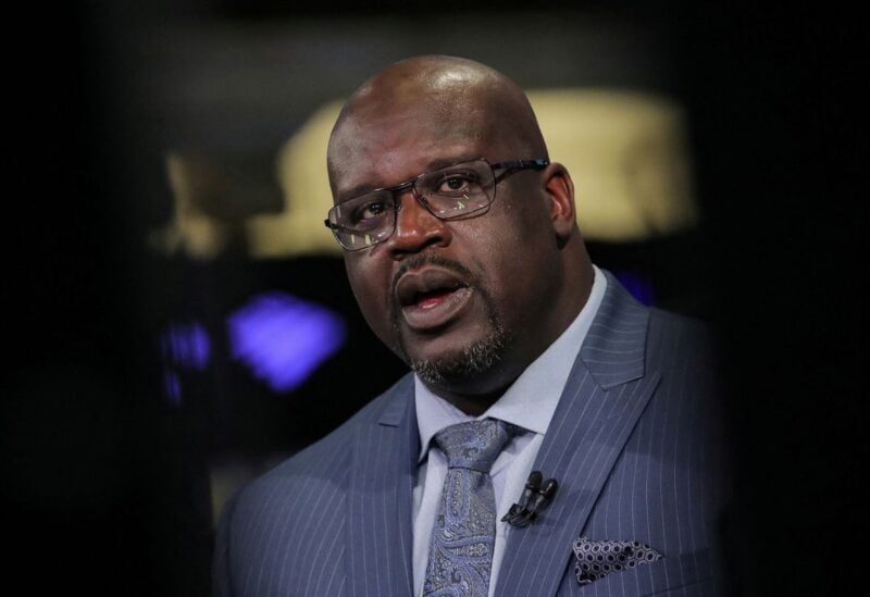 Former basketball star Shaquille O'Neal, speaks during an interview on CNBC about joining the board of Papa John’s International Inc., on the floor of the New York Stock Exchange (NYSE) in New York, U.S., March 22, 2019. REUTERS/Brendan McDermid/File Photo