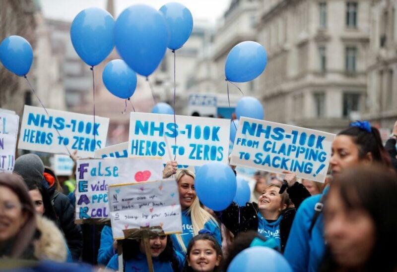 NHS staff march in a protest against the coronavirus disease (COVID-19) vaccine rules, in London, Britain, January 22, 2022. REUTERS/Peter Nicholls