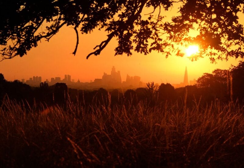 The sun rises above the London skyline, as a second heatwave is predicted for parts of the country, in London, Britain, August 11, 2022. REUTERS/Toby Melville