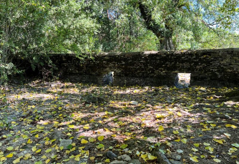 A general view of a weir and dried riverbed near the source of the River Thames, in Kemble, in Gloucestershire, Britain August 10, 2022. REUTERS/Lucy Marks