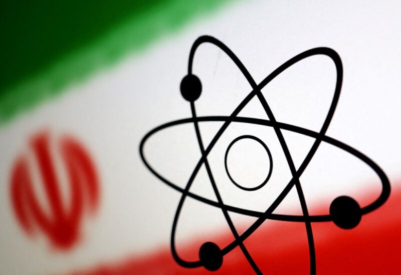 The atomic symbol and the Iranian flag are seen in this illustration, July 21, 2022. REUTERS/Dado Ruvic/Illustration/File Photo