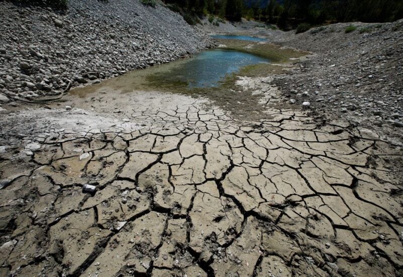 Cracked and dry earth is seen on the banks of Le Broc lake, as a historical drought hits France, August 5, 2022