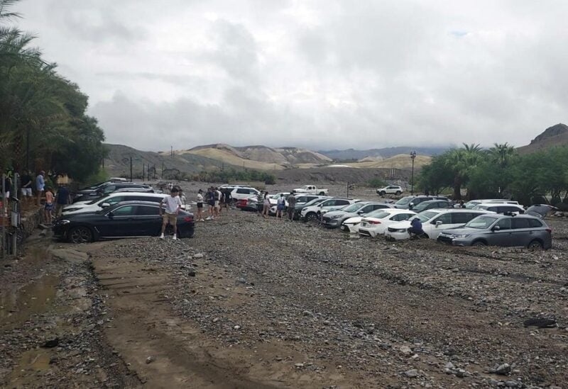 In this photo provided by the National Park Service, cars are stuck in mud and debris from flash flooding at The Inn at Death Valley in Death Valley National Park, Calif., Friday, Aug. 5, 2022. Heavy rainfall triggered flash flooding that closed several roads in Death Valley National Park on Friday near the California-Nevada line. The National Weather Service reported that all park roads had been closed after 1 to 2 inches of rain fell in a short amount of time. (National Park Service via AP)