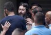 Bassam al-Sheikh Hussein, an armed man who took hostages, leaves the branch of a Federal bank in Beirut, Lebanon, 11 August 2022