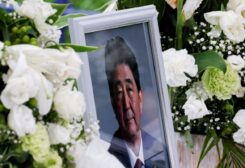 A picture of late former Japanese Prime Minister Shinzo Abe, who was gunned down while campaigning for a parliamentary election, is seen at Headquarters of the Japanese Liberal Democratic Party in Tokyo, Japan July 12, 2022. REUTERS/Kim Kyung-Hoon/File Photo