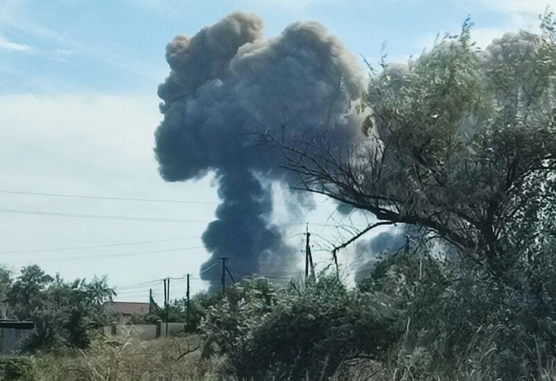 Smoke rises after explosions were heard from the direction of a Russian military airbase near Novofedorivka, Crimea August 9, 2022. REUTERS/Stringer