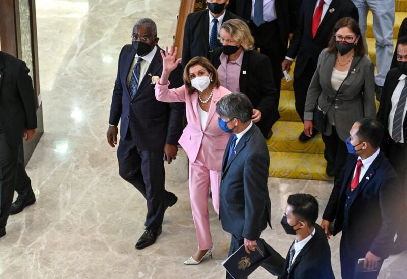 U.S. House of Representatives Speaker Nancy Pelosi waves after attending a meeting with Malaysia's Parliament Speaker Azhar Azizan Harun at Malaysian Houses of Parliament in Kuala Lumpur, Malaysia, August 2, 2022. Malaysian Department of Information/Nazri Rapaai/Handout via REUTERS