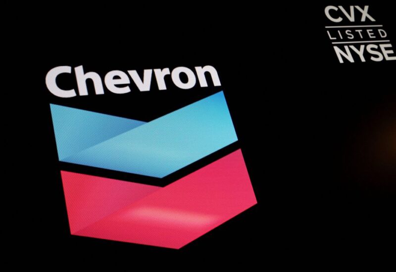 The logo and trading information for Chevron is displayed on a screen on the floor of the New York Stock Exchange (NYSE) in New York City, U.S., June 27, 2022. REUTERS/Brendan McDermid