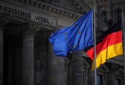 The flags of EU and Germany fly in front of Reichstag building, the seat of the lower house of the German parliament Bundestag, in Berlin, Germany, April 5, 2022. REUTERS/Lisi Niesner