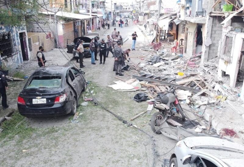 Members of the security forces check in the area of an explosion that left people injured and others dead and destroyed several houses and vehicles, according to local media reports,in southern Guayaquil, Ecuador August 14, 2022. Ecuador National Police/Handout via REUTERS ATTENTION EDITORS - THIS IMAGE WAS PROVIDED BY A THIRD PARTY. NO RESALES. NO ARCHIVES