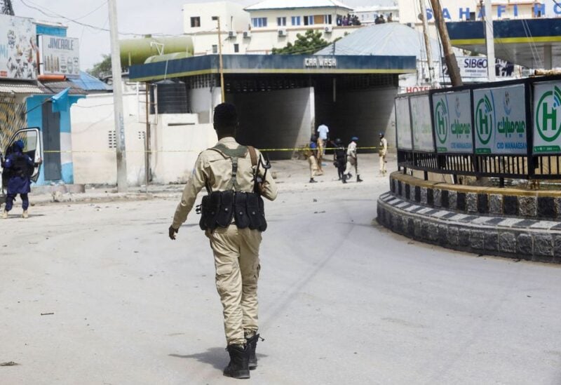 Somali security officers are seen at a section of Hotel Hayat, the scene of an al Qaeda-linked al Shabaab group militant attack in Mogadishu, Somalia August 20, 2022