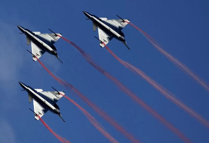 China's J-10 fighter jets from the People's Liberation Army Air Force August 1st Aerobatics Team perform during a media demonstration at the Korat Royal Thai Air Force Base, Nakhon Ratchasima province, Thailand, November 24, 2015