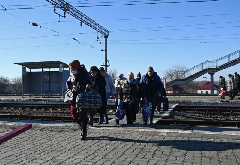 People evacuated from the self-proclaimed Donetsk People's Republic (DNR) arrive at the Uspenkaya railway station in the Rostov region, Russia February 19, 2022. REUTERS