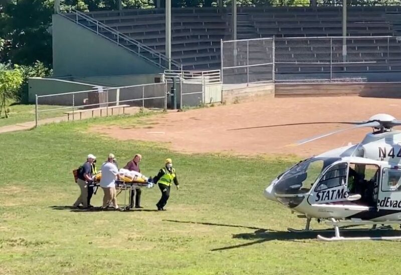 Author Salman Rushdie is transported to a helicopter after he was stabbed on stage before his scheduled speech at the Chautauqua Institution, Chautauqua, New York, U.S.