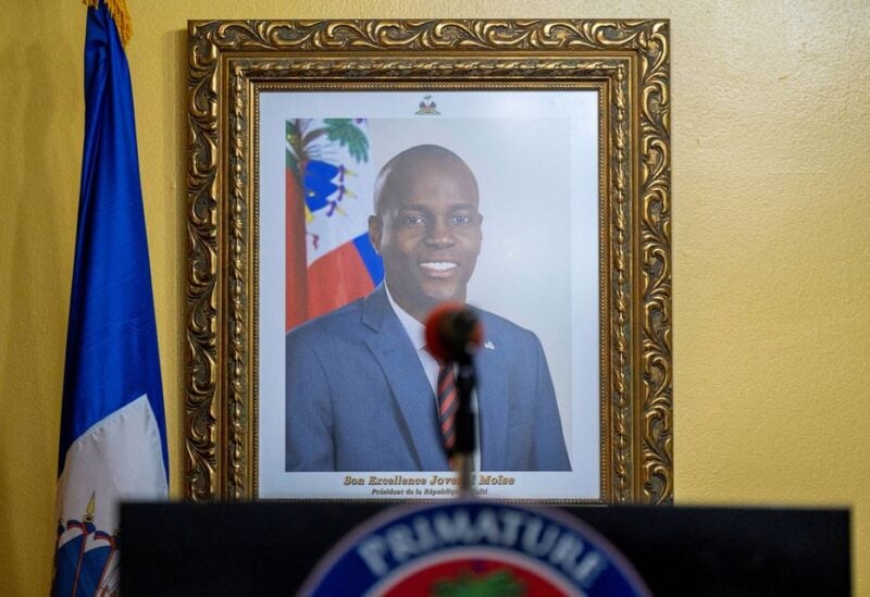 A picture of late Haitian President Jovenel Moise hangs on a wall before a news conference at his house
