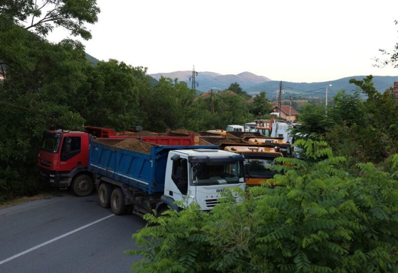 A general view shows trucks blocking a road in Rudare, Kosovo, August 1, 2022