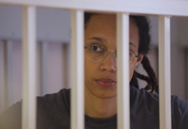 U.S. basketball player Brittney Griner, who was detained at Moscow's Sheremetyevo airport and later charged with illegal possession of cannabis, stands inside a defendants' cage during the reading of the court's verdict in Khimki outside Moscow, Russia August 4, 2022. REUTERS/Evgenia Novozhenina/Pool