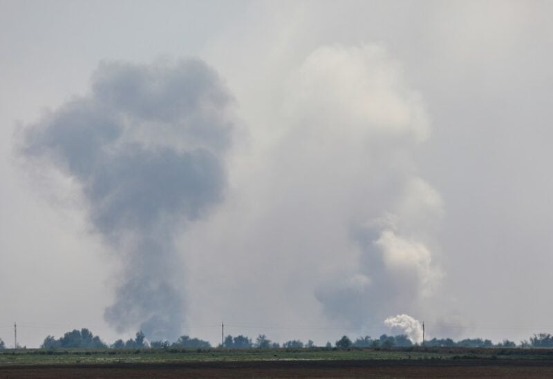 A view shows smoke rising above the area following an alleged explosion in the village of Mayskoye in the Dzhankoi district, Crimea, August 16, 2022. REUTERS/Stringer