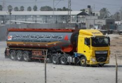 A truck carrying fuel imports for the lone power plant rolls into Gaza, after Israel eased up closures, as ceasefire holds in Rafah in the southern Gaza Strip, August 8, 2022. REUTERS/Ibraheem Abu Mustafa