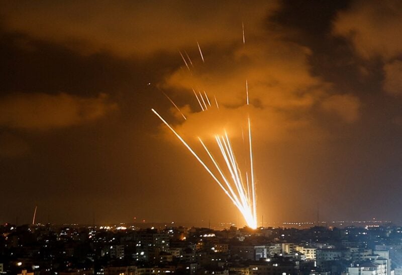 Rockets are fired by Palestinian militants into Israel, amid Israeli-Palestinian fighting, in Gaza City August 5, 2022. REUTERS/Mohammed Salem