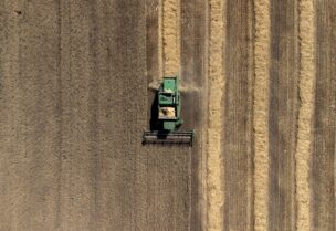 A combine harvests a wheat field, as Russia's attack on Ukraine continues, in Dnipropetrovsk region, Ukraine, July 30, 2022. REUTERS/Alkis Konstantinidis TPX IMAGES OF THE DAY